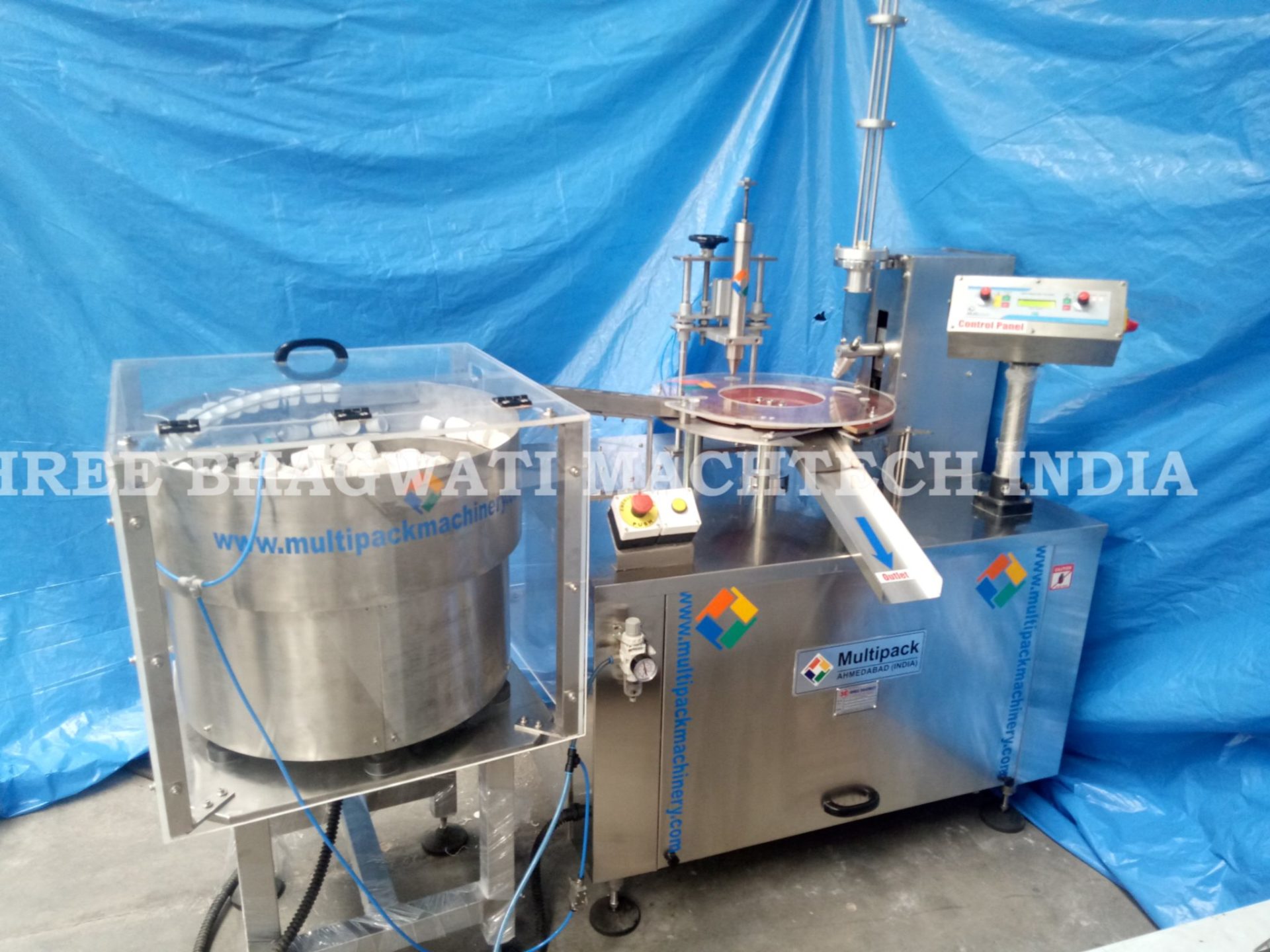 Cap lining machine with cap feeder enclosure specially designed for Hygienic and avoid any particle during cap wadding .